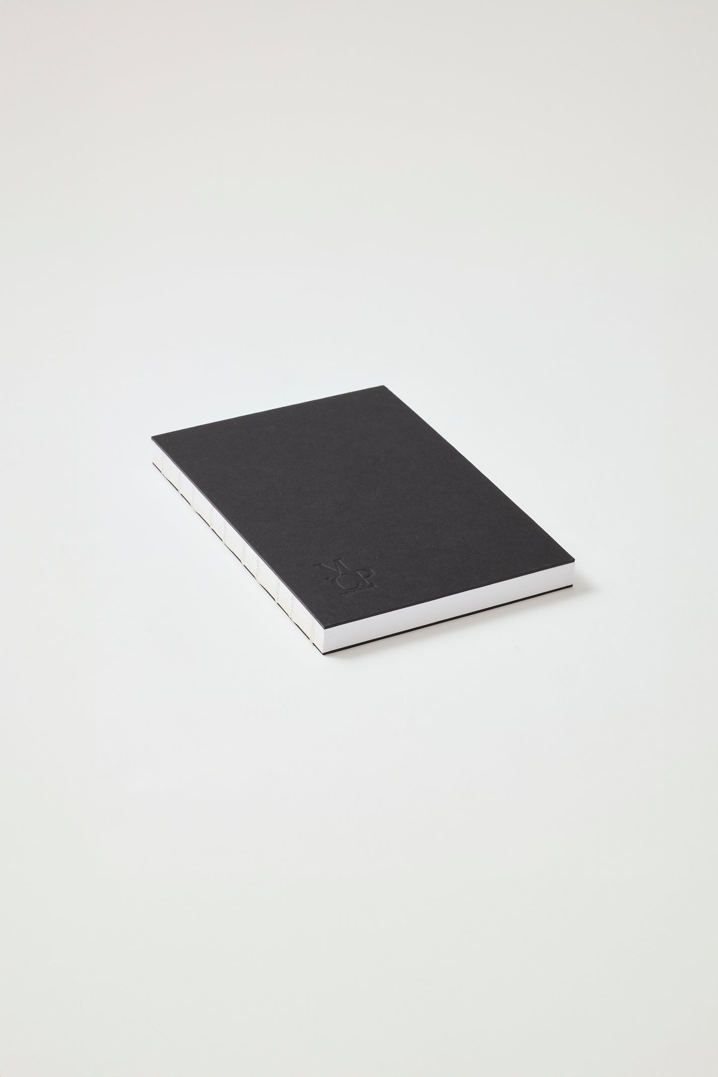 Black stitched spine notebook