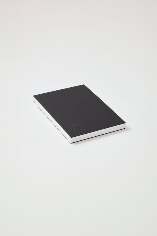 Black stitched spine notebook