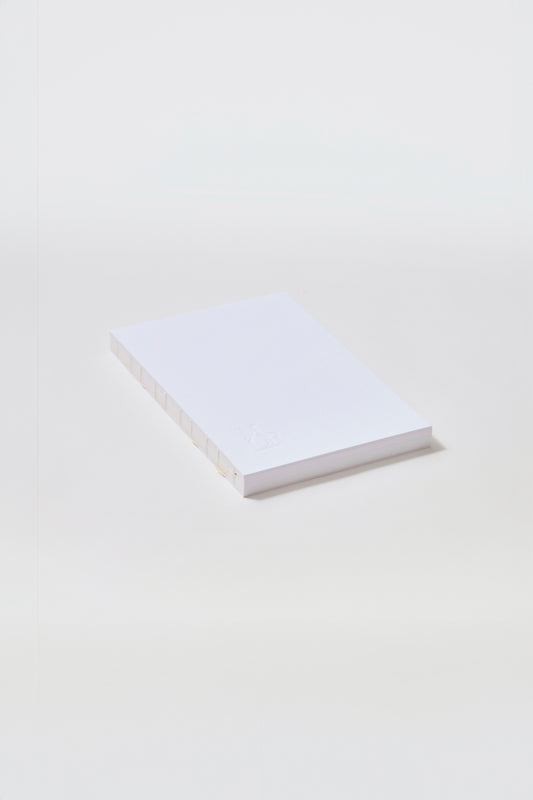 White stitched spine notebook