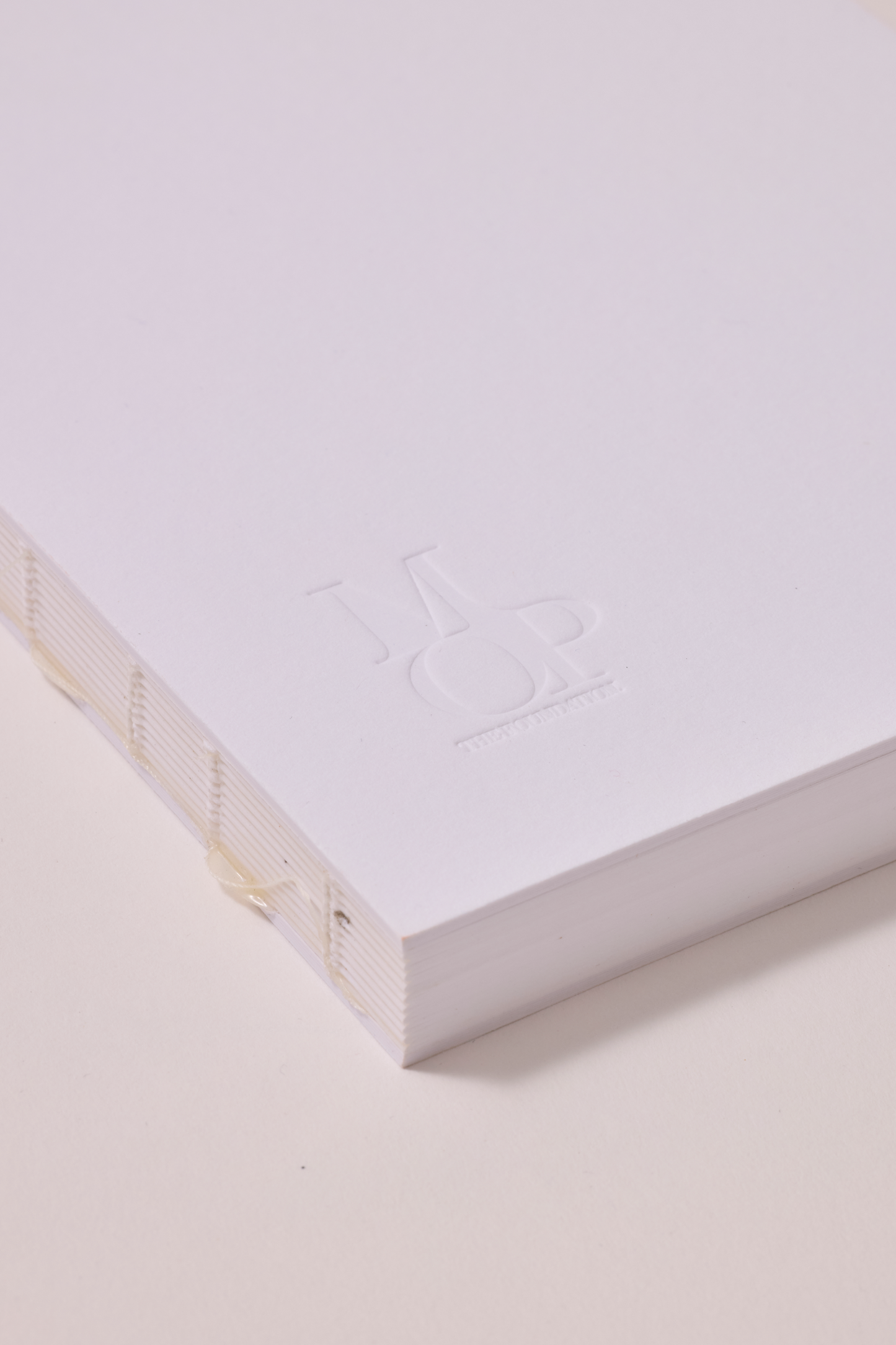 White stitched spine notebook